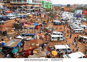 stock-photo-kampala-uganda-september-people-and-taxis-move-about-their-busy-day-in-the-downtown-153512771